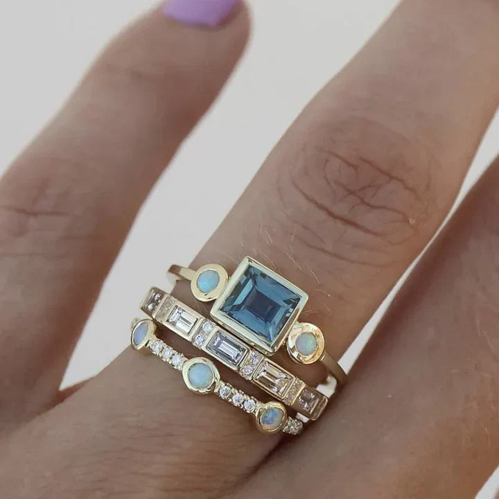Set of vintage rings with blue zirconia