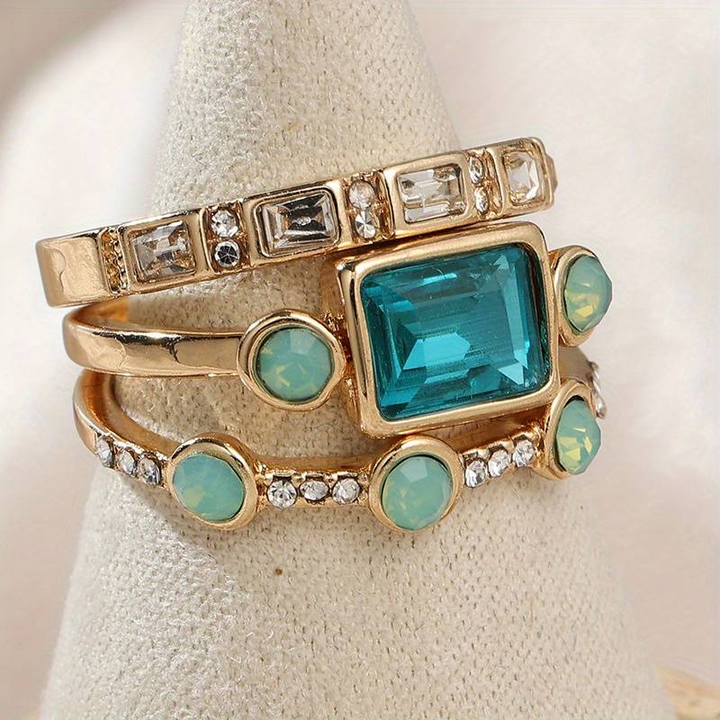 Set of vintage rings with blue zirconia