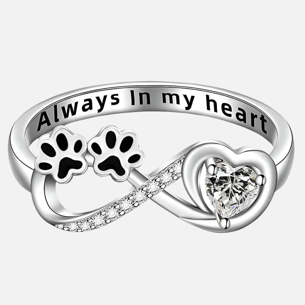 Ring with paw-shaped zirconia, heart and infinity symbol